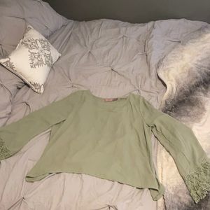 Green long sleeve with open back